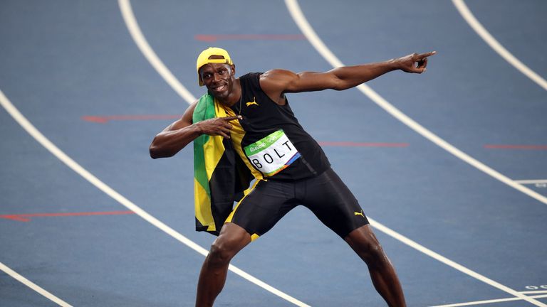 Jamaica's Usain Bolt celebrates winning the men's 100m final 