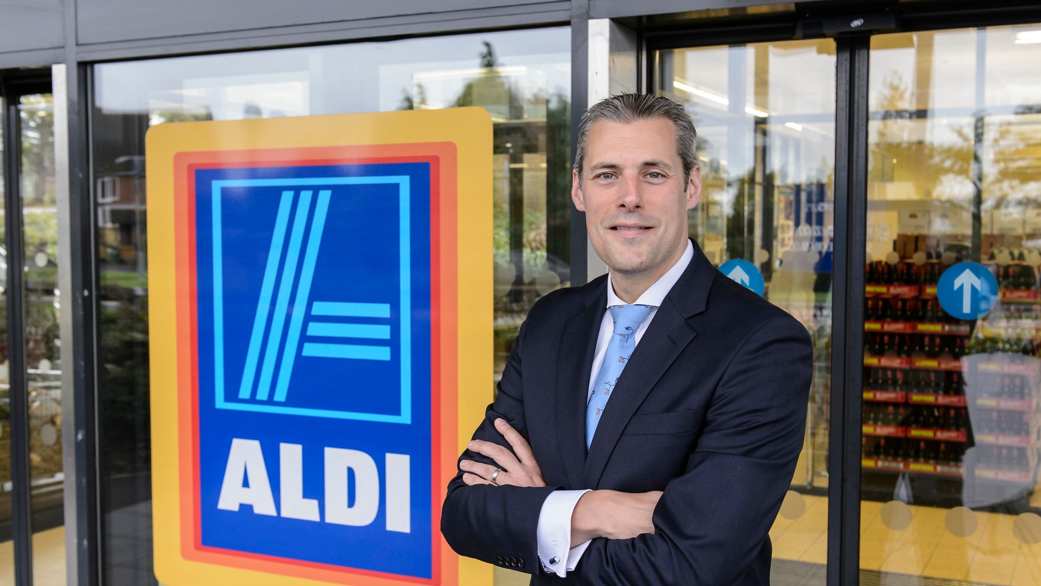 Discounter Aldi ups pay war with Lidl by raising minimum wage