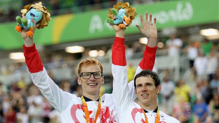 Britons Steve Bate and Adam Duggleby celebrate winning gold in the men&#39;s B 4000m individual pursuit track cycling.