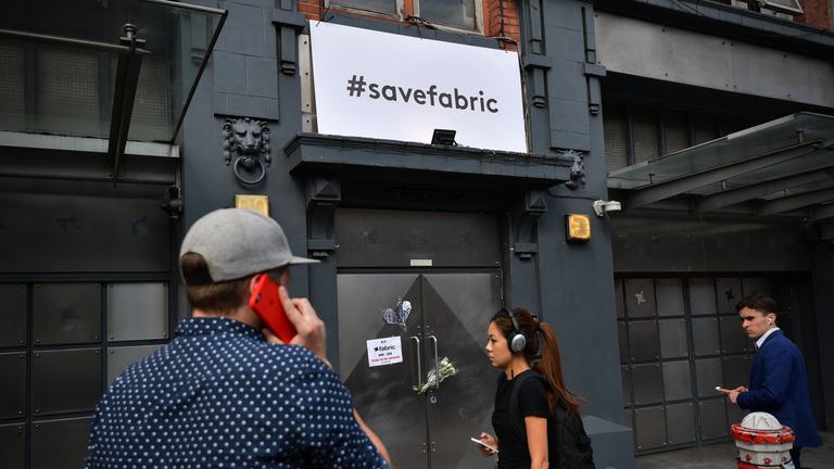 LONDON, ENGLAND - SEPTEMBER 07: People stand outside Fabric nightclub following the announcement of its closure on September 7, 2016 in London, England. Fabric, which opened in 1999 and was voted World Number 1 Club in DJ Magazine&#39;s &#39;Top 100 Clubs Poll&#39; in 2007 and 2008, has had its licence revoked by Islington council, a decision that has been condemned across the political spectrum. (Photo by Carl Court/Getty Images)