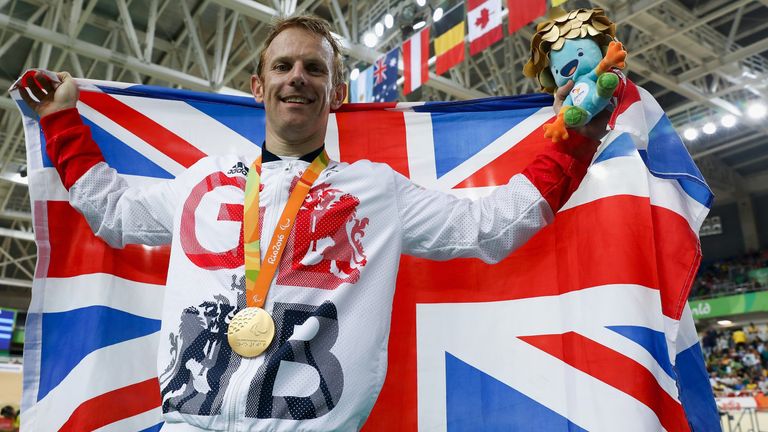 Gold medalist Jody Cundy of Great Britain celebrates on the podium at the medal ceremony for Men&#39;s 1km Time Trial C4-5 Final on day 2 of the Rio 2016 Paralympics at Rio Olympic Velodrome on September 9, 2016 in Rio de Janeiro, Brazil