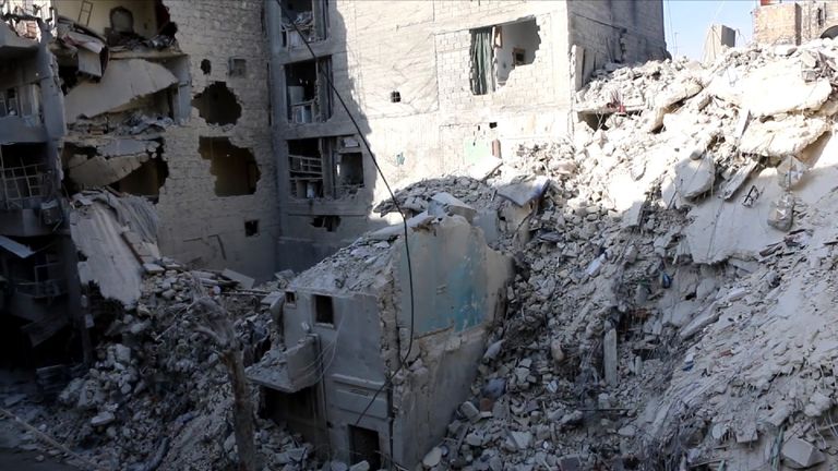 Damage caused to buildings after the Syrian government-led bombing in eastern Aleppo