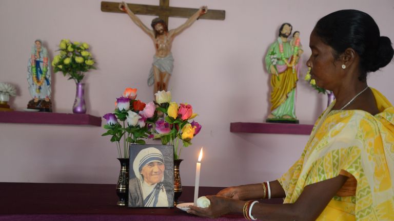 Monica Besra prays in the Mother Teresa Church in Nakur, 310 miles from Kolkata