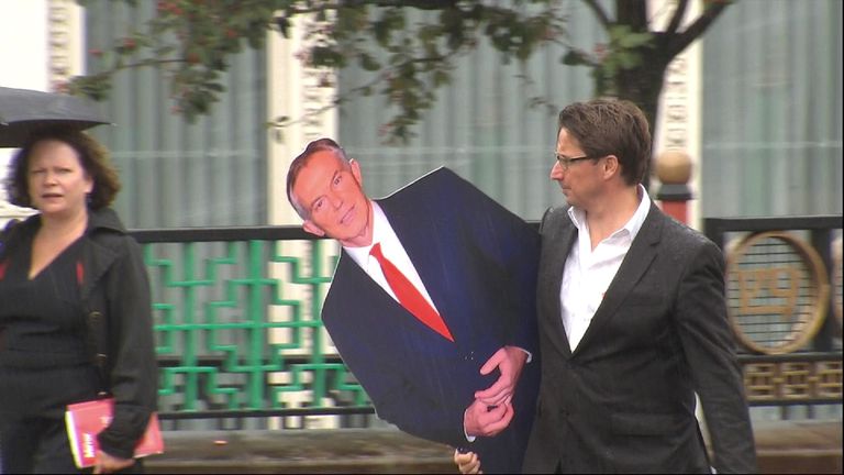 Jason Farrell takes a cut-out of former Labour Prime Minister Tony Blair to the Momentum Conference in Liverpool. 