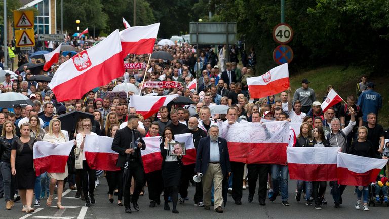 Silent march held in Harlow after Polish mans dies in suspected &#39;hate crime&#39; attack