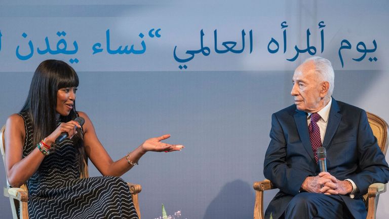 Naomi Campbell and former Israeli President Shimon Peres attend  an International Women&#39;s Day conference at the Peres Center for Peace in Tel Aviv 