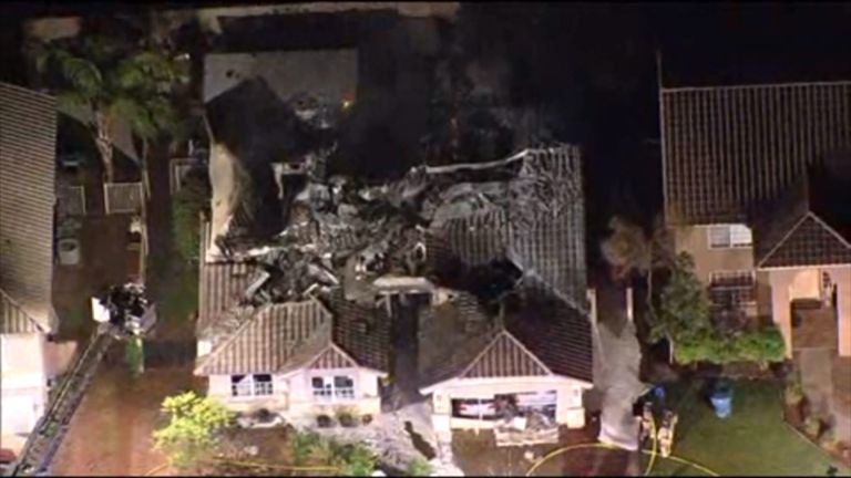 Aftermath of skydivers&#39; jump plane crash into house in Gilbert, Arizona