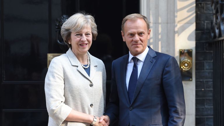 PM Theresa May greets European Council president Donald Tusk