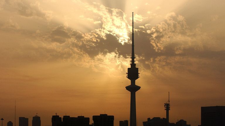 The sun sets over Kuwait City