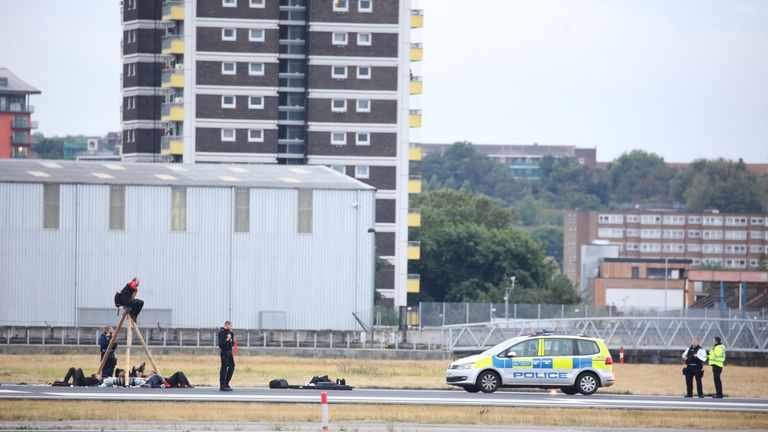 Black Lives Matter protesters on the runway at London City Airport