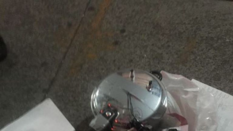 The suspect device found by police appeared to be a pressure cooker connected to a mobile phone by wires
