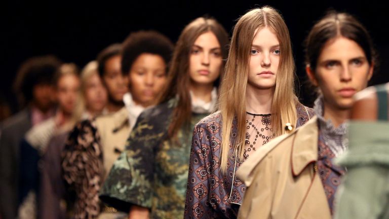 Models present creations at the Burberry catwalk show