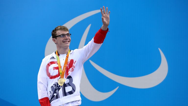 Matthew Wylie poses with his gold medal after winning Men&#39;s 50 metres Freestyle - S9
