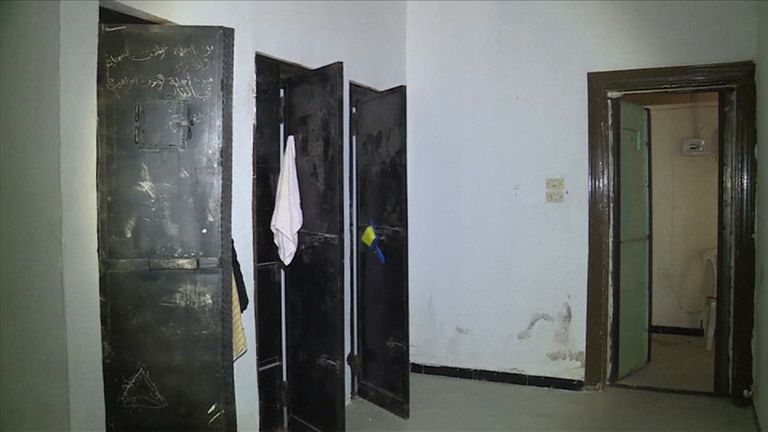 Fighters from the Manbij Military Council have found a prison used by Islamic State group (IS) militants to imprison and torture women, according to news agency Arab24. Pictured are metal doors to apparent cells.