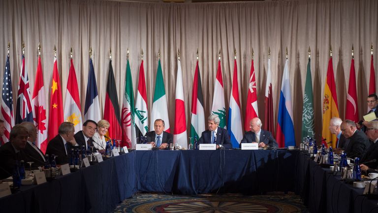 Sergei Lavrov (centre left) and John Kerry (centre) among delegates at the International Syria Support Group meeting in New York 