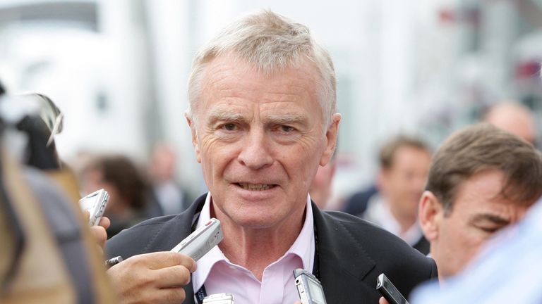 FIA president Max Mosley in the paddock, hounded by the media before the British Grand Prix at Silverstone, Northamptonshire.