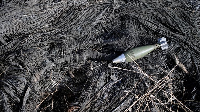 A mortar round left by Islamic States fighters is seen in Bartella