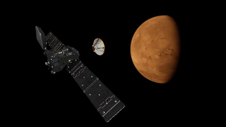 Artist&#39;s impression issued by European Space Agency of Schiaparelli lander detaching from the ExoMars Trace Gas Orbiter.