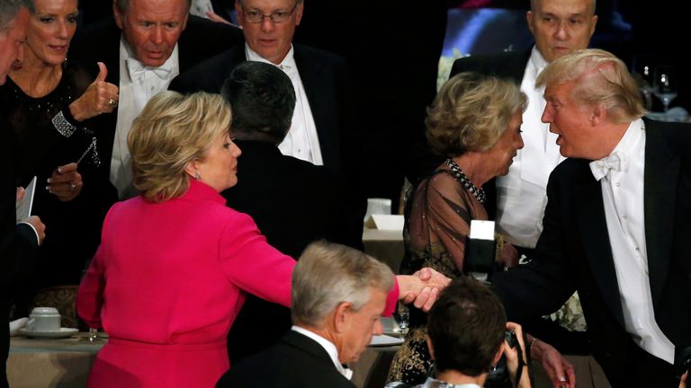 Unlike during the last two debates, Clinton and Trump shook hands at the dinner