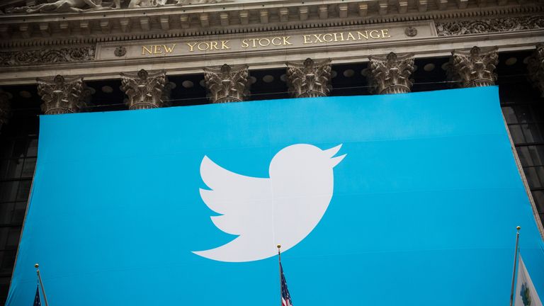 The Twitter logo is displayed on a banner outside the New York Stock Exchange