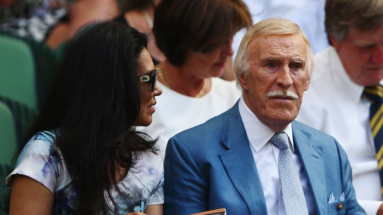 Sir Bruce picturedwith his wife at Wimbledon in July 2015