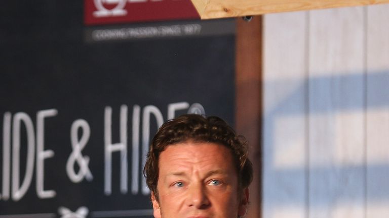 Jamie Oliver attends a cooking demo at the Neff Big Kitchen on day two of The Big Feastival at Alex James' Farm on August 27, 2016