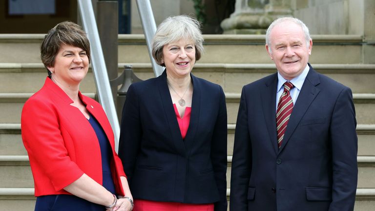 Theresa May, (C), with Northern Ireland First Minister Arlene Foster and Deputy First Minister Martin McGuinness 