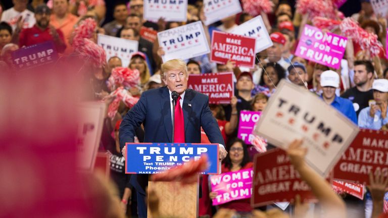 Donald Trump addresses a rally in Arizona