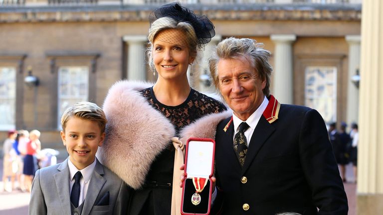 Veteran singer Sir Rod Stewart at Buckingham Palace in London, with his wife, Penny Lancaster and children Alastair and Aiden, after he received his knighthood in recognition of his services to music and charity