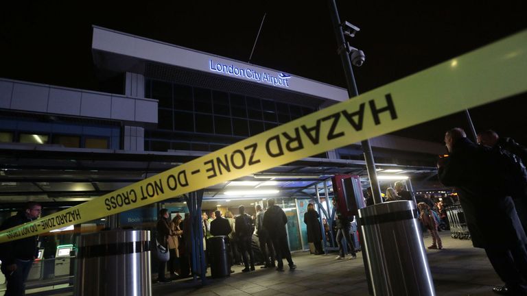 Police tape marks off the entrance to London City Airport