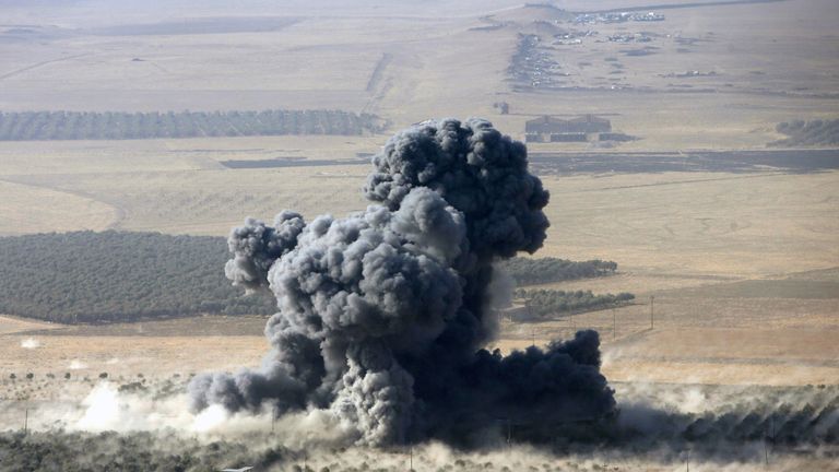 Smoke rises at Islamic State militants' positions in the town of Nawaran, near Mosul