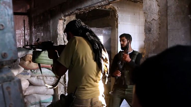 Syrian resistance fighters defend their position in the city of Aleppo