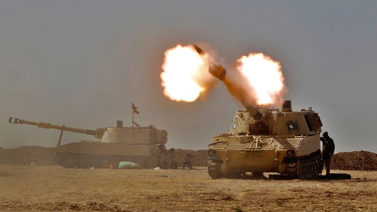 An Iraqi forces M109 self-propelled howitzer fires towards the village of Tall al-Tibah