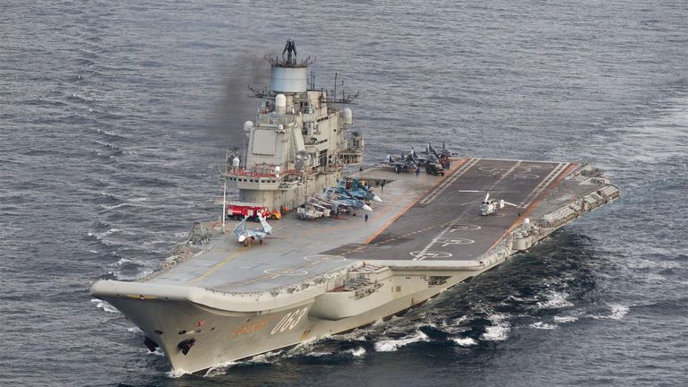 A photo taken from a Norwegian surveillance aircraft shows Russian aircraft carrier Admiral Kuznetsov in international waters off the coast of Northern Norway