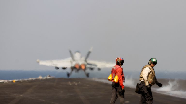An F/A-18E Super Hornet takes off for Mosul, Iraq to provide air-support 