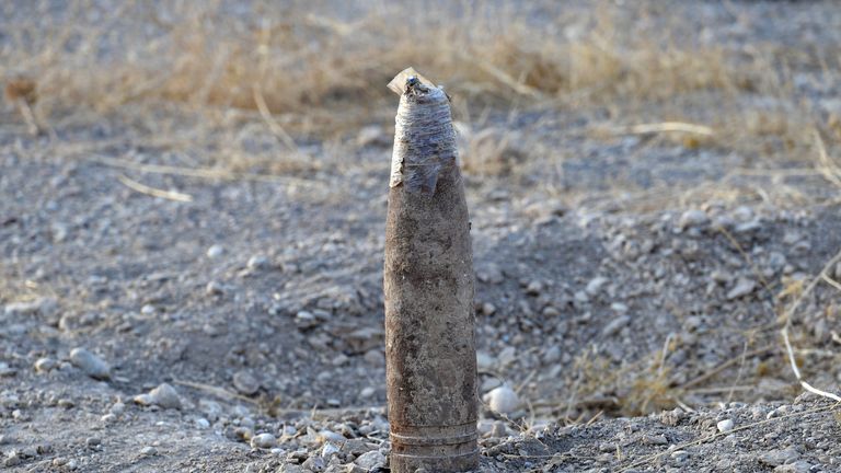 MOSUL, IRAQ - OCTOBER 18: An unexploded IED (improvised explosive device) left by ISIS is seen on the road from Erbil to Mosul, on October 18, 2016 in the small town of Bartella near Mosul, Iraq. Joint forces from countries including Britain, U.S.A and France have joined Iraq and Iraqi Kurdistan to launch what is believed to be the largest ground operation since the invasion of Iraq in 2003 to retake Iraq's second largest city from the Islamic State who have held it since 2014. (Photo by Carl Co