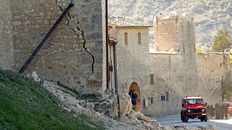 A giant crack down the wall of homes in  Norcia