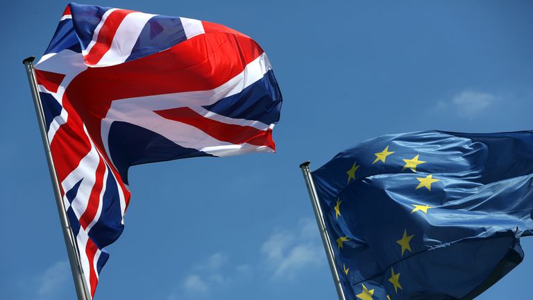 The Union Jack and EU flags.