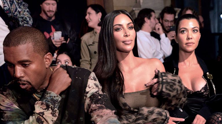 Kanye West at the Off-White show in Paris with wife Kim Kardashian