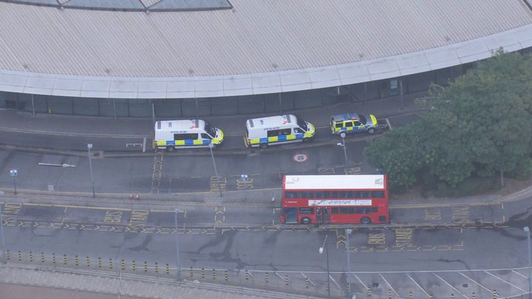 Aerial shot of police outside North Greenwich Tube station on Oct 20, 2016. Station is closed and a controlled explosion has been carried out following discovery of suspicious item.