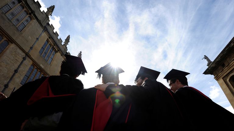 A group of Oxford University graduates celebrate