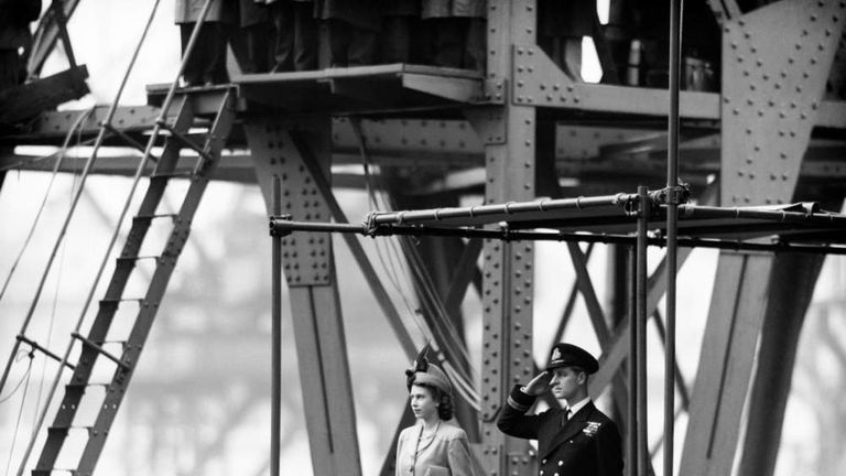 Princess Elizabeth with Lieutenant Mountbatten watch the launching of RMS Caronia at Clydebank in October 1947
