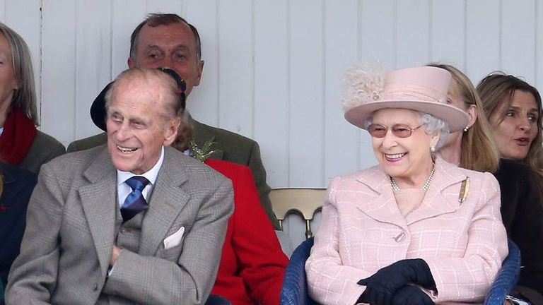 The Royal couple laugh as they watch the sack race during the annual Braemer Highland Games on 7 September 2013 in Braemar, Scotland