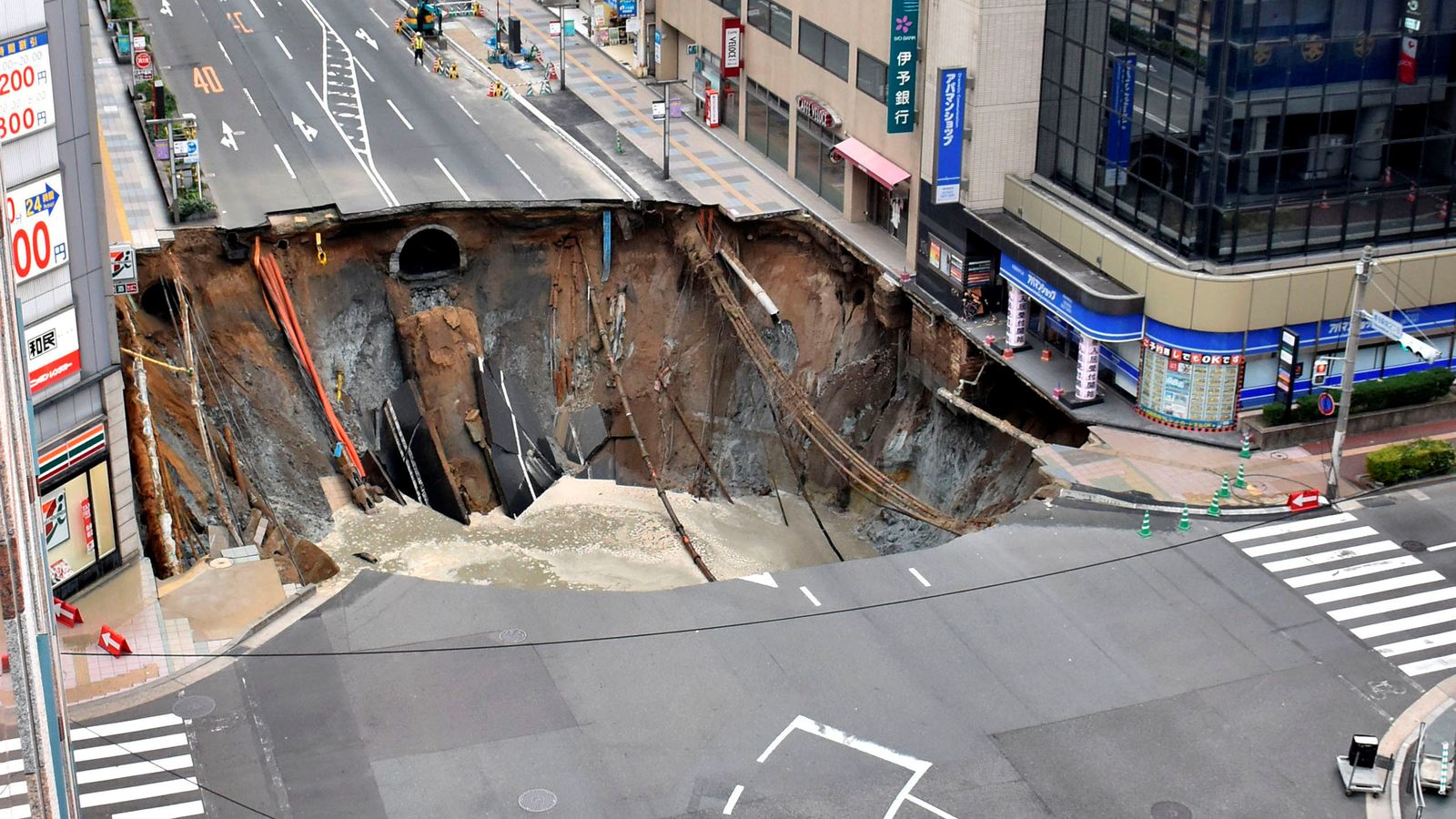 Caught On Camera: Sinkhole Swallows A Four-lane Highway | Scoop News ...