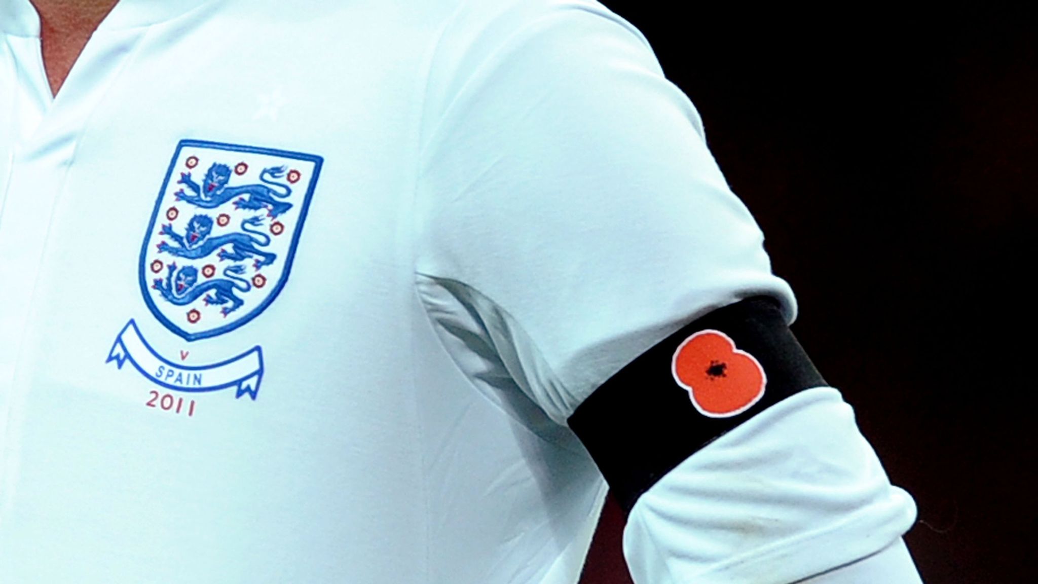 England football shop shirt with poppy