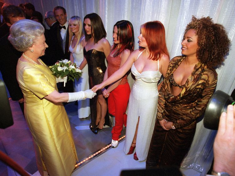 The Queen shakes hands with Geri Halliwell of Spice Girls in 1997