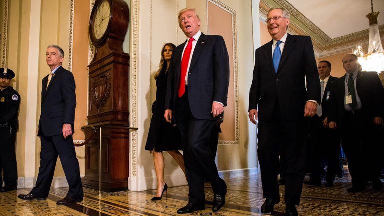 Mr Trump leaves a meeting with Senate Majority Leader Mitch McConnell