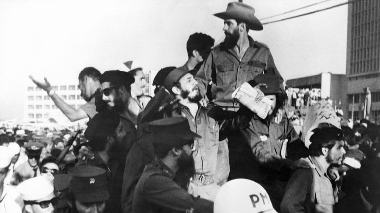 Camilo Cienfuegos (top with hat) Ernesto Che Guevara (right with beret) and Fidel Castro enter Havana after victory over Cuban dictator Fulgencio Batista