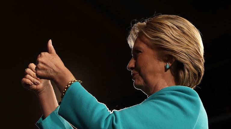 Democratic presidential nominee former Secretary of State Hillary Clinton greets supporters during a campaign rally at the Cleveland Public Auditorium on November 6, 2016 in Cleveland, Ohio