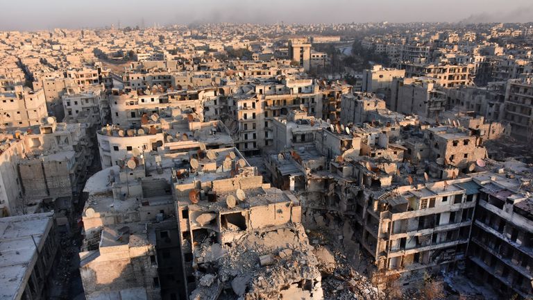 A general view of Aleppo taken from the top of a building in the city&#39;s Bustan al-Basha neighbourhood on November 28, 2016, during Syrian government forces assault to retake the entire northern city from rebel fighters. In a major breakthrough in the push to retake the whole city, regime forces captured six rebel-held districts of eastern Aleppo over the weekend, including Masaken Hanano, the biggest of those in eastern Aleppo. / AFP / GEORGE OURFALIAN (Photo credit should read GEORGE OURFALIAN/